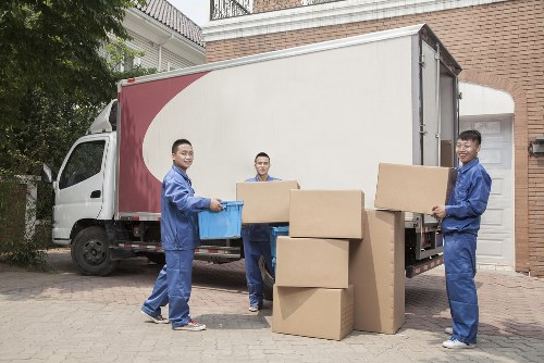 Professional furniture movers handling bulky items in Finchley