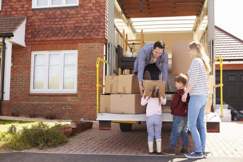 Local removals team loading furniture for a same day move