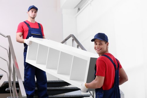 Residential flat move with narrow stair access in Finchley