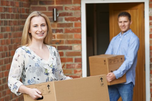 House removal team planning a move in Finchley on a residential street