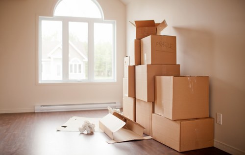 Professional office moving team handling furniture and equipment